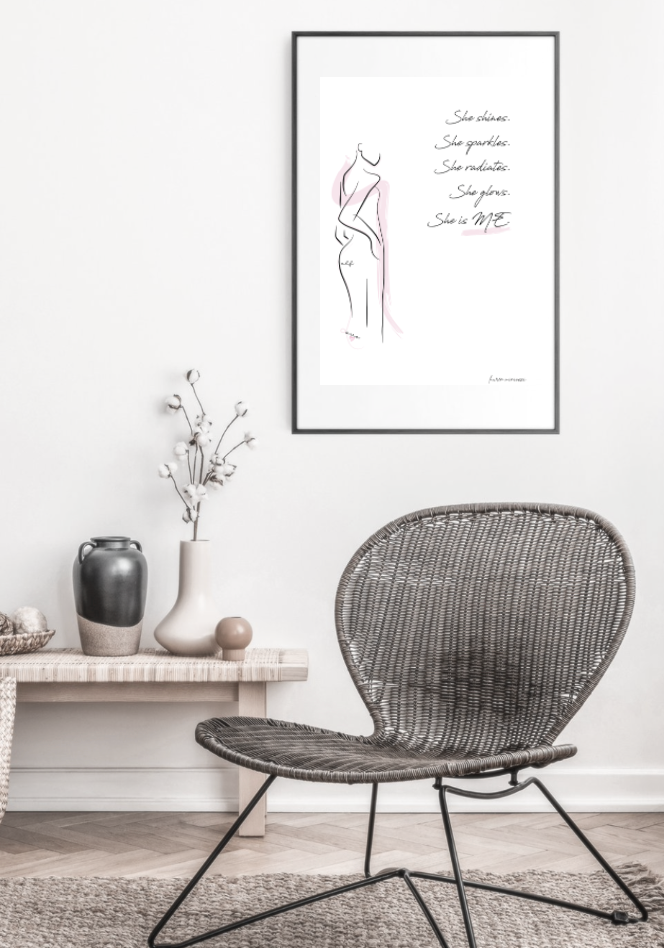 She is me radiance graphic female line print in frame above chair